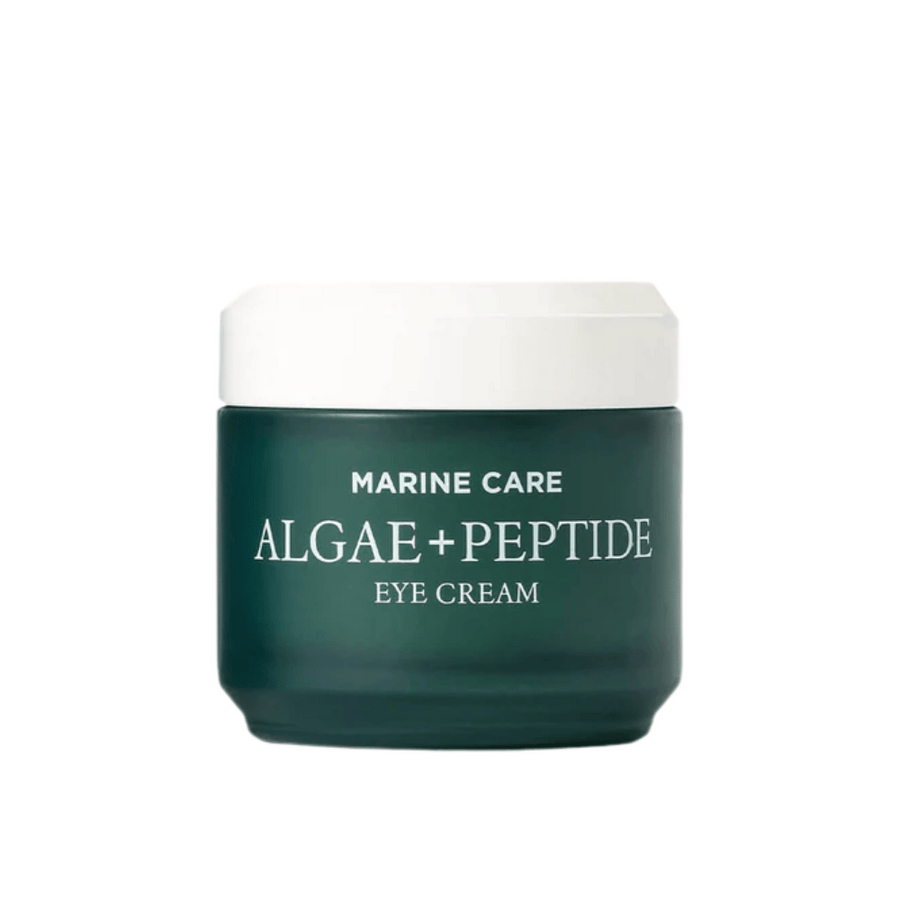 Heimish Marine Care Algae + Peptide Eye Cream i en mörkgrön burk med vit lock. En ögonkräm berikad med alger och peptider för att återfukta, ljusa upp och reducera fina linjer runt ögonen.