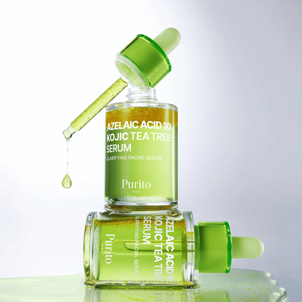 Purito Azelaic Acid 10 Kojic Tea Tree Serum – fräsch grön formula med dropp från pipett som visar serumets lätta textur.