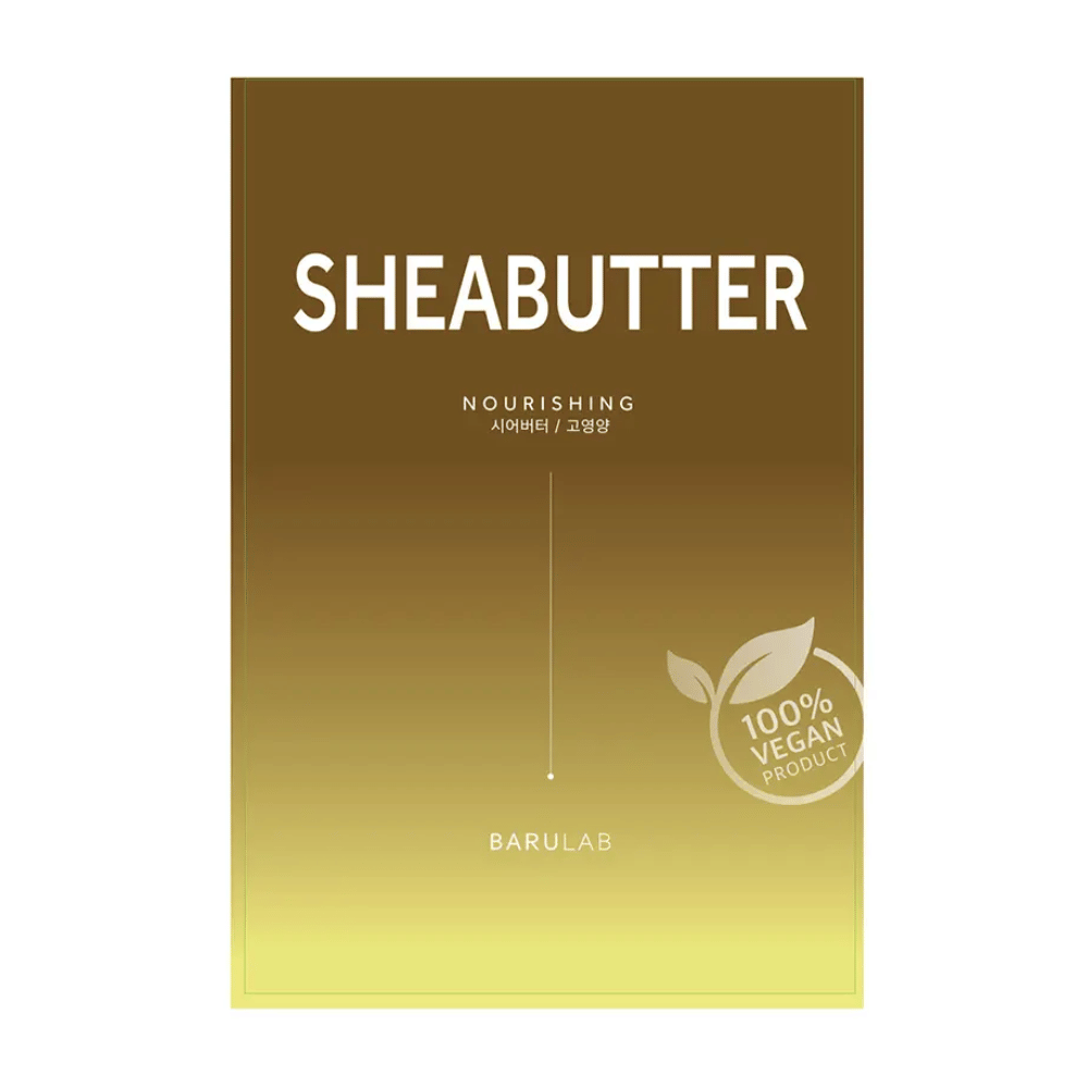En förpackning av BARULAB "SHEABUTTER Nourishing" mask, märkt som "100% Vegan Product". Förpackningen har en färggradient som övergår från mörk guldbrun i toppen till ljus gul i botten.
