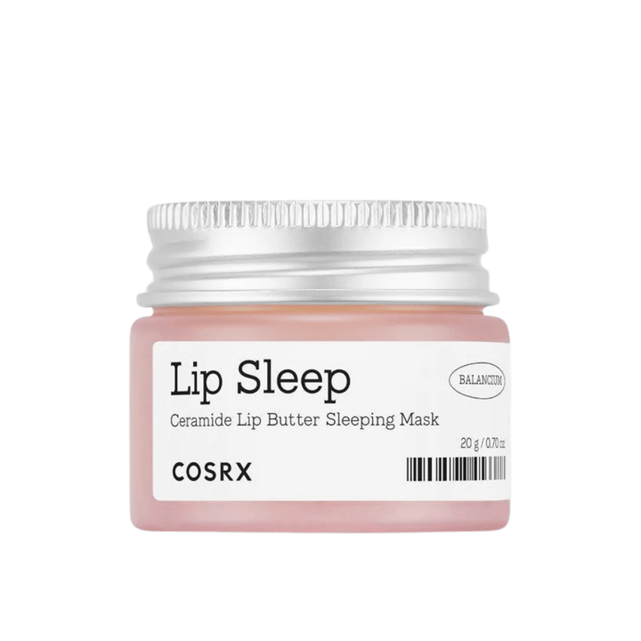 COSRX Lip Sleep Ceramide Lip Butter Sleeping Mask i rosa burk med silverlock. En doftfri, närande nattmask för mjuka, återfuktade läppar.