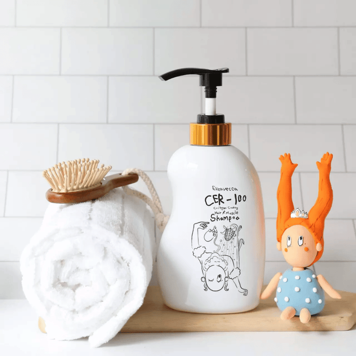 Elizavecca CER-100 Collagen Coating Hair A+ Muscle Shampoo – stärkande kollagen schampo för torrt och skadat hår i badrumsmiljö