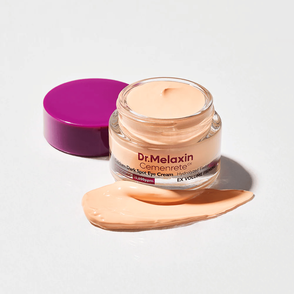 Dr.Melaxin Cemenrete Calcium Dark Spot Eye Cream i öppen burk med krämtextur, ögonkräm som hjälper till att reducera mörka ringar och ge fastare hud runt ögonen.