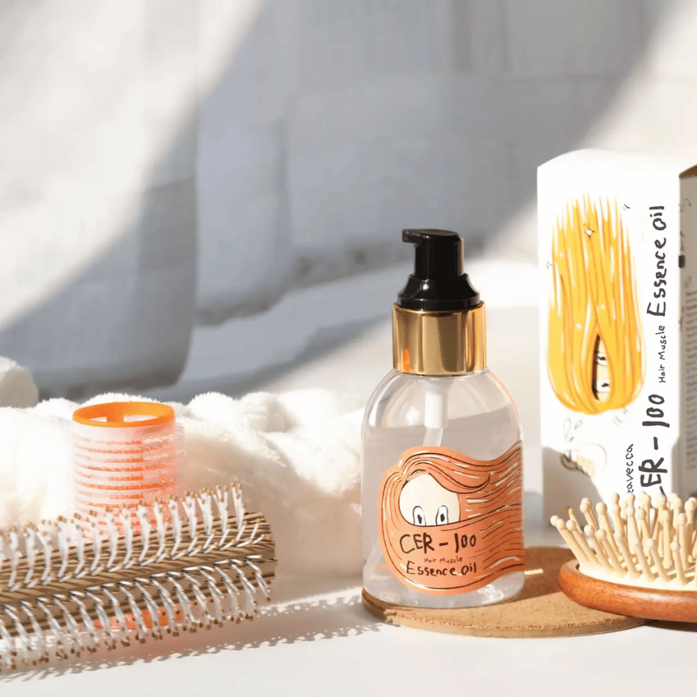 Elizavecca CER-100 Hair Muscle Essence Oil styling – återfuktande hårolja som hjälper till att minska friss, ge glans och skydda håret vid styling.