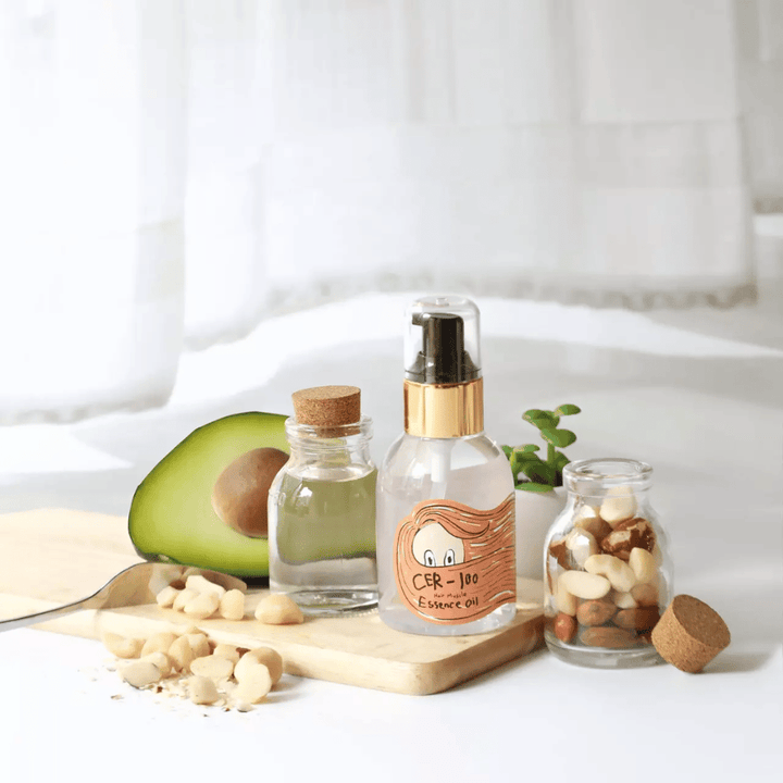 Elizavecca CER-100 Hair Muscle Essence Oil – koreansk hårolja med avokado och naturliga oljor som hjälper till att återfukta, stärka och ge glans till torrt och skadat hår.