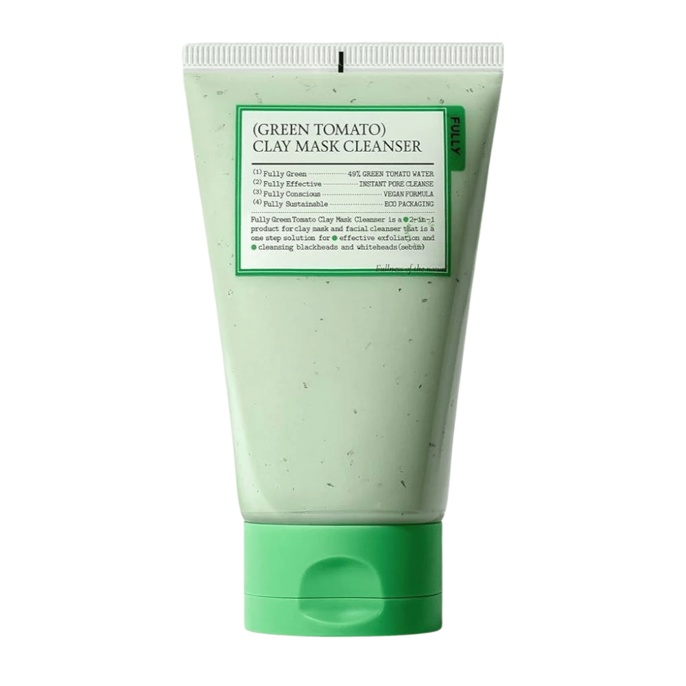 En produktbild av Green Tomato Clay Mask Cleanser i en grön tub mot vit bakgrund. Fokus är på förpackningen och designen.