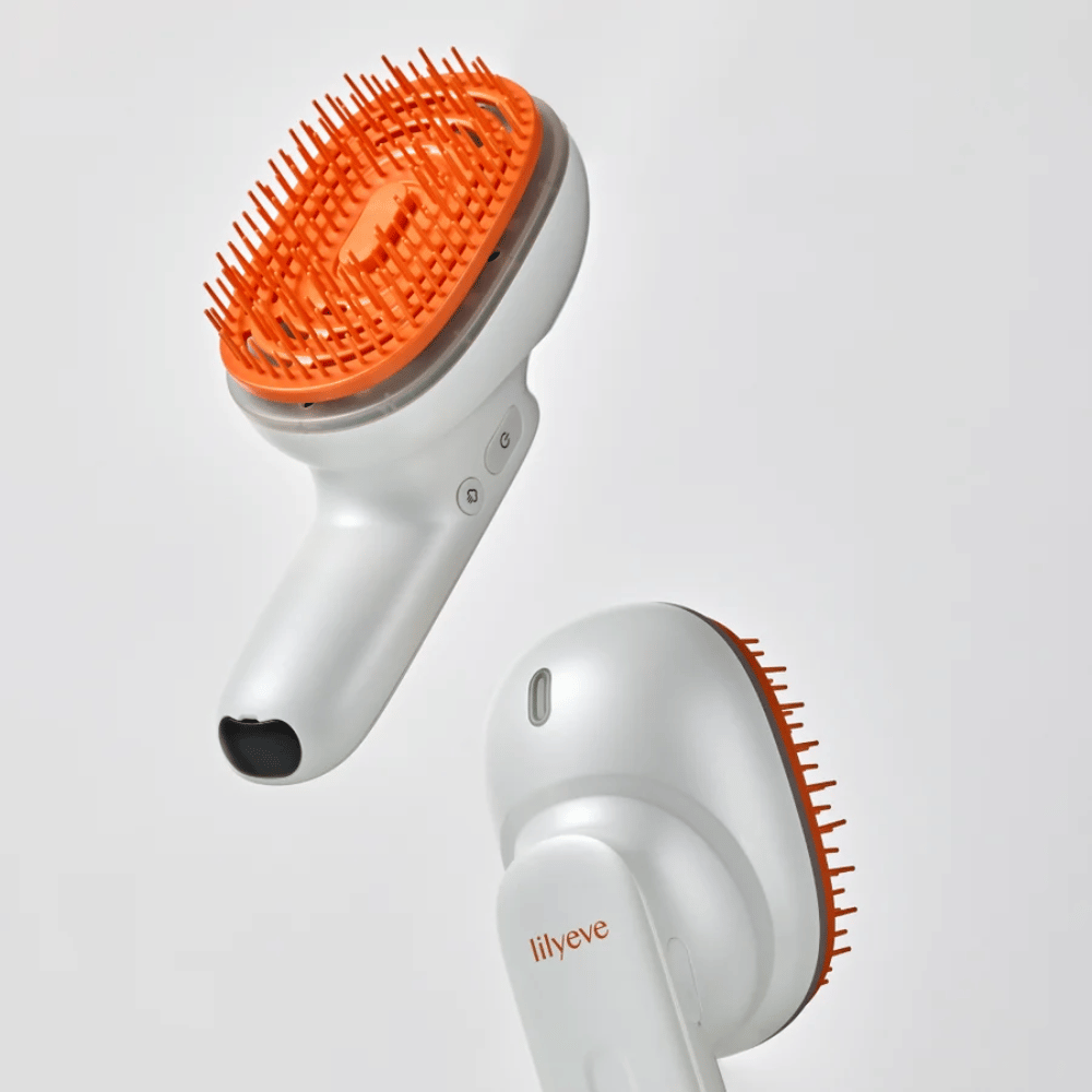 LILYEVE GrowTurn Brush Steam Booster – fram- och baksida med ergonomiskt handtag och orange borst