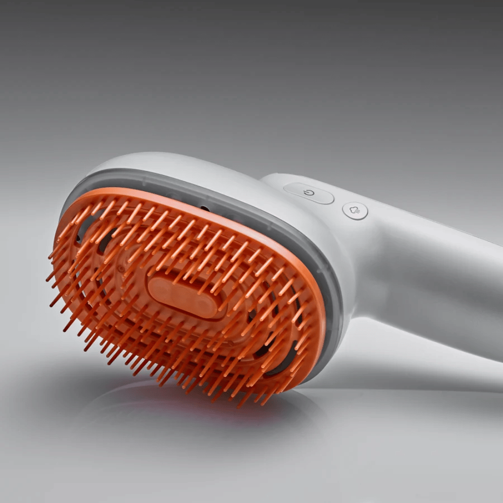 LILYEVE GrowTurn Brush Steam Booster – närbild på borsthuvud och kontrollknappar