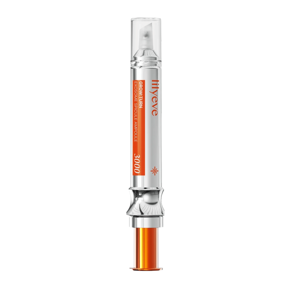 LILYEVE Grow Turn Exosome Spicule Ampoule 3000 – hårbottenampull med precisionsapplikator i silver- och orangefärgad förpackning.