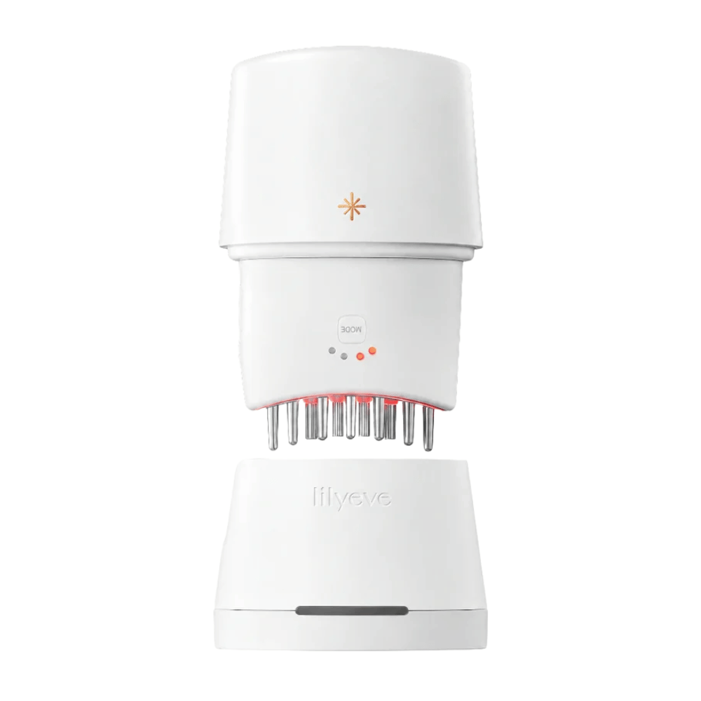 5. Lilyeve GrowTurn Pro – vit hårbottenapparat med rött LED-ljus och tillhörande laddningsstation