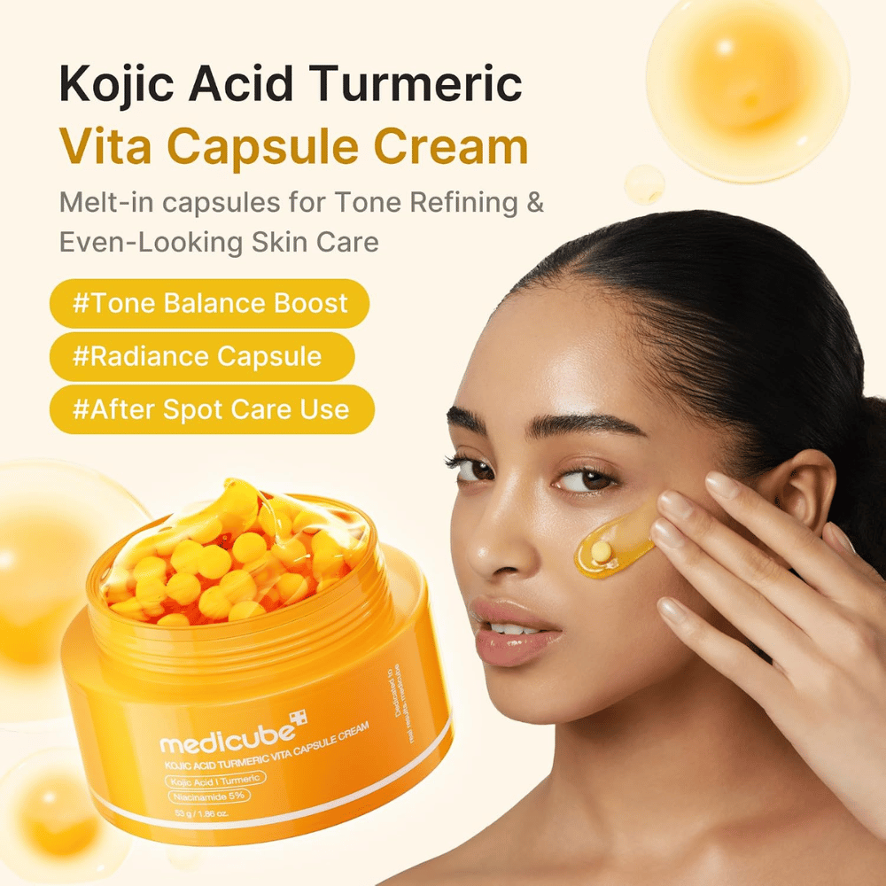 4. Medicube Kojic Acid Turmeric Vita Capsule Cream – lystergivande ansiktskräm med kapslar som appliceras på kinden