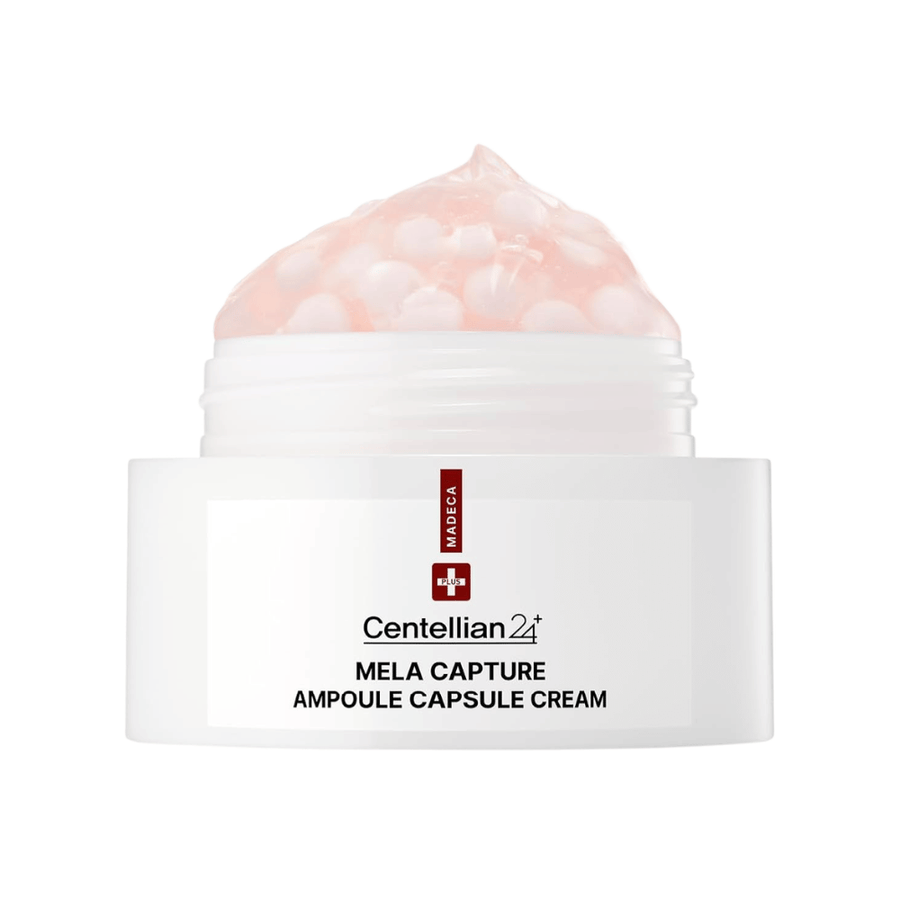 Närbild av Centellian24 Madeca Mela Capture Ampoule Capsule Cream som visar den rosa gelkrämen med inkapslade ampullkulor i burken.