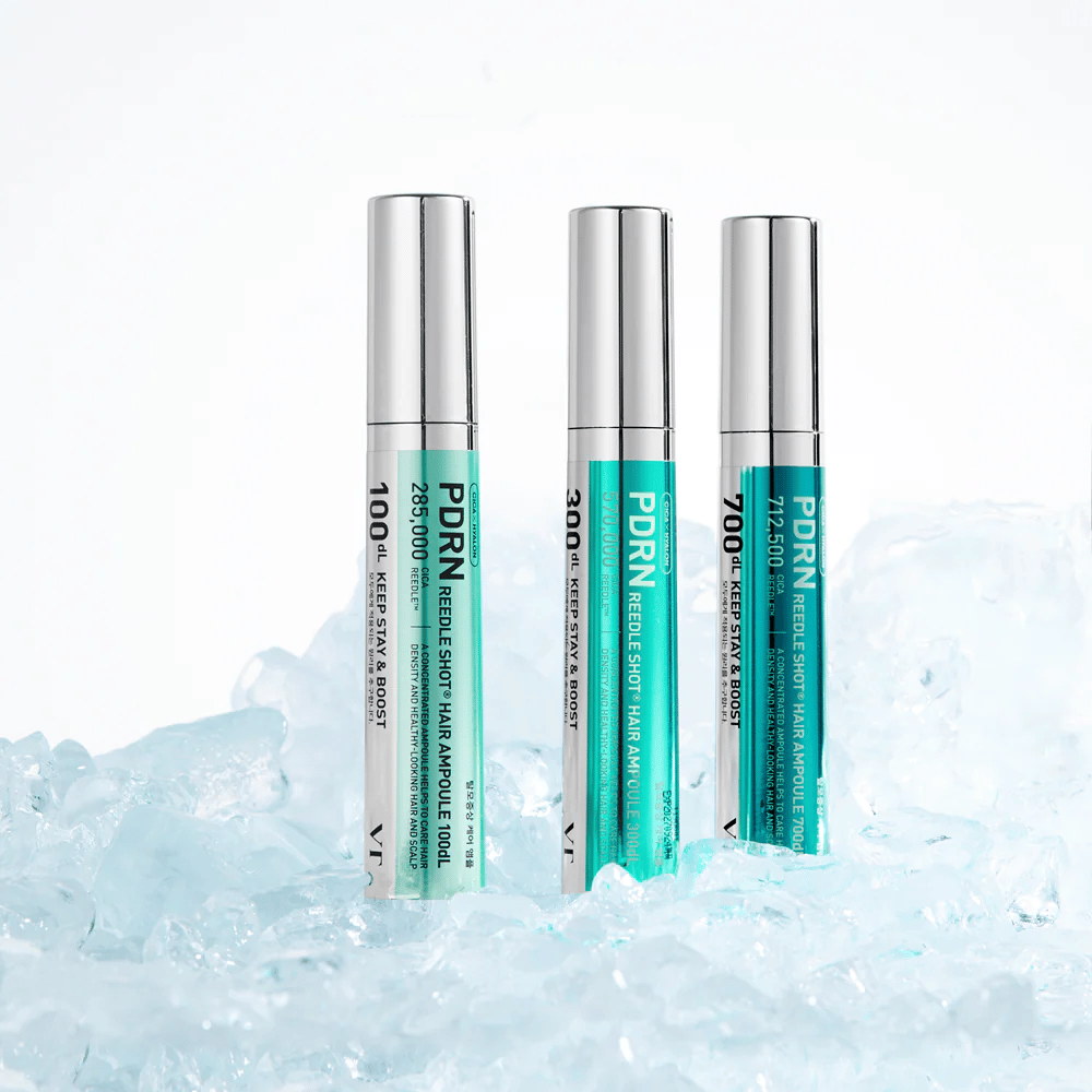 Flera varianter av PDRN Reedle Shot Hair Ampoule placerade på is, som symboliserar uppfriskande effekt och intensiv vård för en balanserad och hälsosam hårbotten.