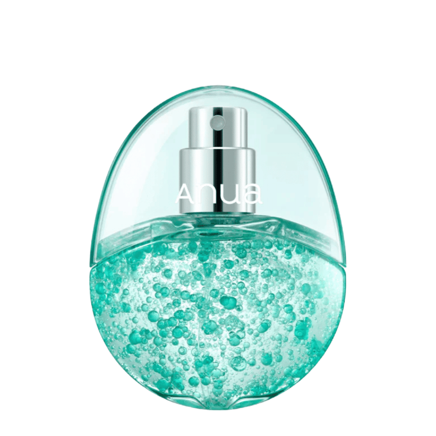 Frilagd produktbild av Anua PDRN Hyaluronic Acid Hydrating Capsule Mist mot ljus bakgrund. Den äggformade flaskan har en transparent övre del och en nedre del fylld med turkosa återfuktande kapslar som framhäver produktens unika formulering och premiumkänsla.