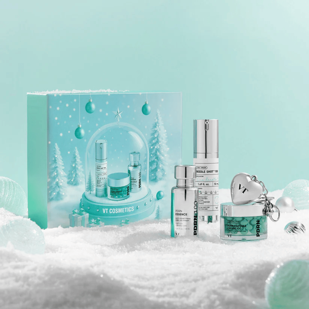 Presentförpackning från VT Cosmetics med PDRN-seriens produkter i julig snöglob-design – perfekt som gåva.