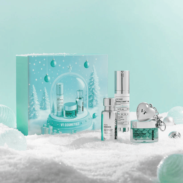 Presentförpackning från VT Cosmetics med PDRN-seriens produkter i julig snöglob-design – perfekt som gåva.