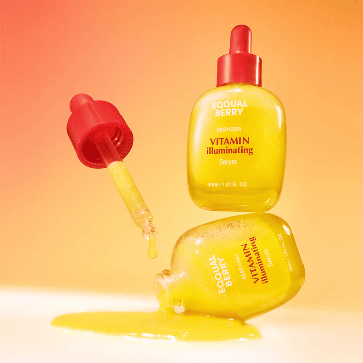 Equal Berry Vitamin Illuminating Serum i en lysande gul flaska med röd pipett. Flytande textur och energisk bakgrund skapar en livlig och fräsch känsla.