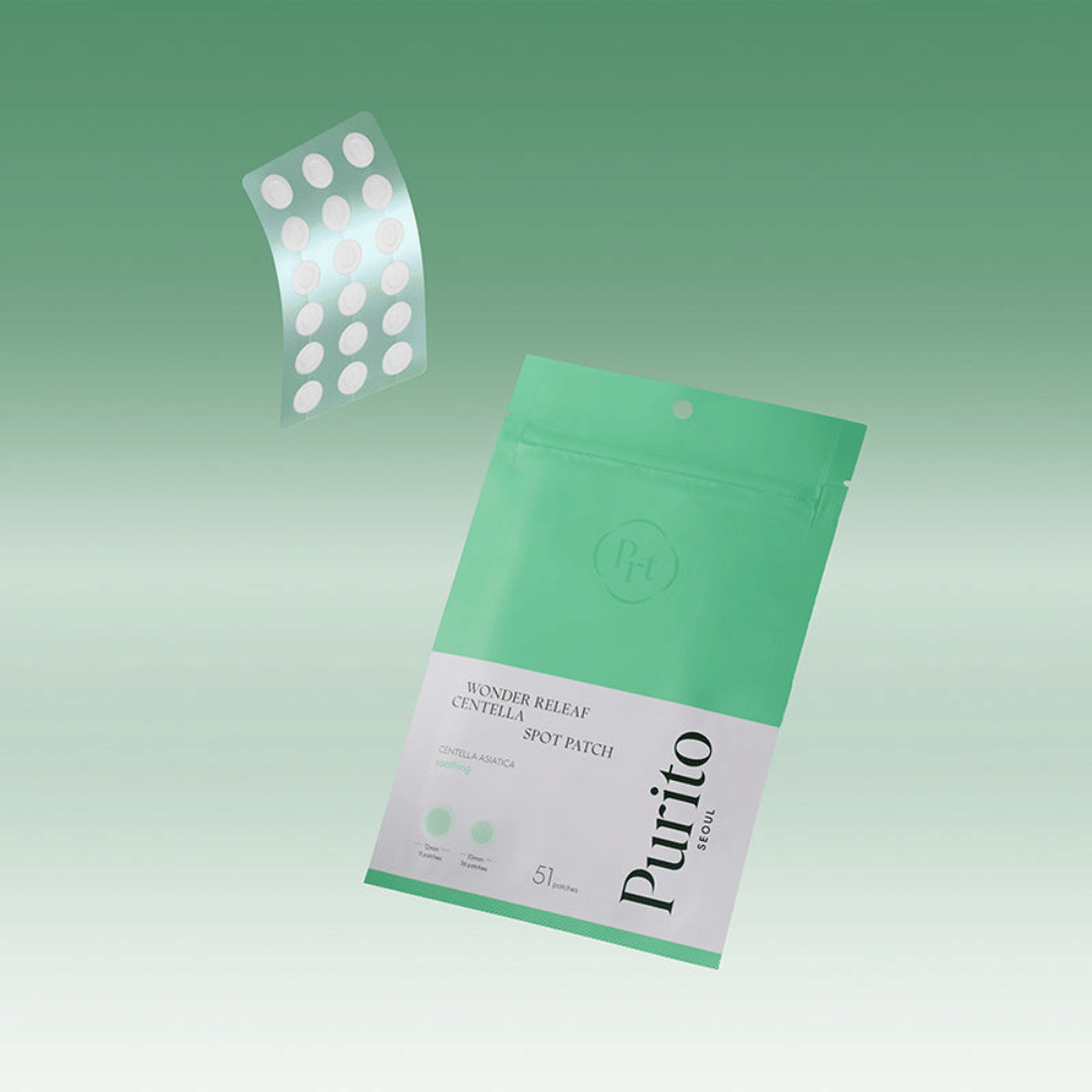 Purito Wonder Releaf Centella Spot Patch med förpackning och genomskinliga acneplåster, lugnande punktbehandling med centella asiatica för finnar och irriterad hud.
